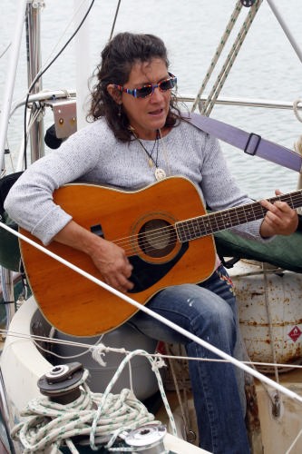 Donna Lange, sailing minstrel, has music CD’s available for purchase to help finance her voyage and costs. © Jane Pares - IMB